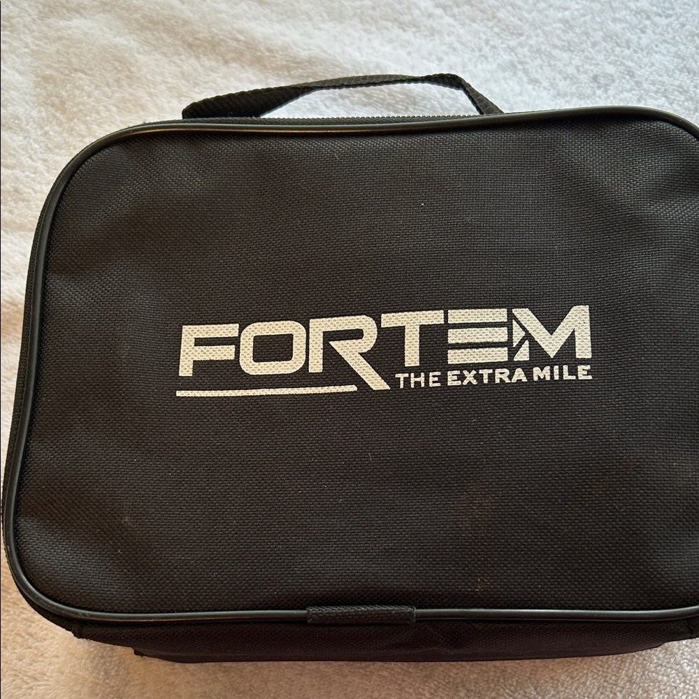 Tire air inflator in carry case
